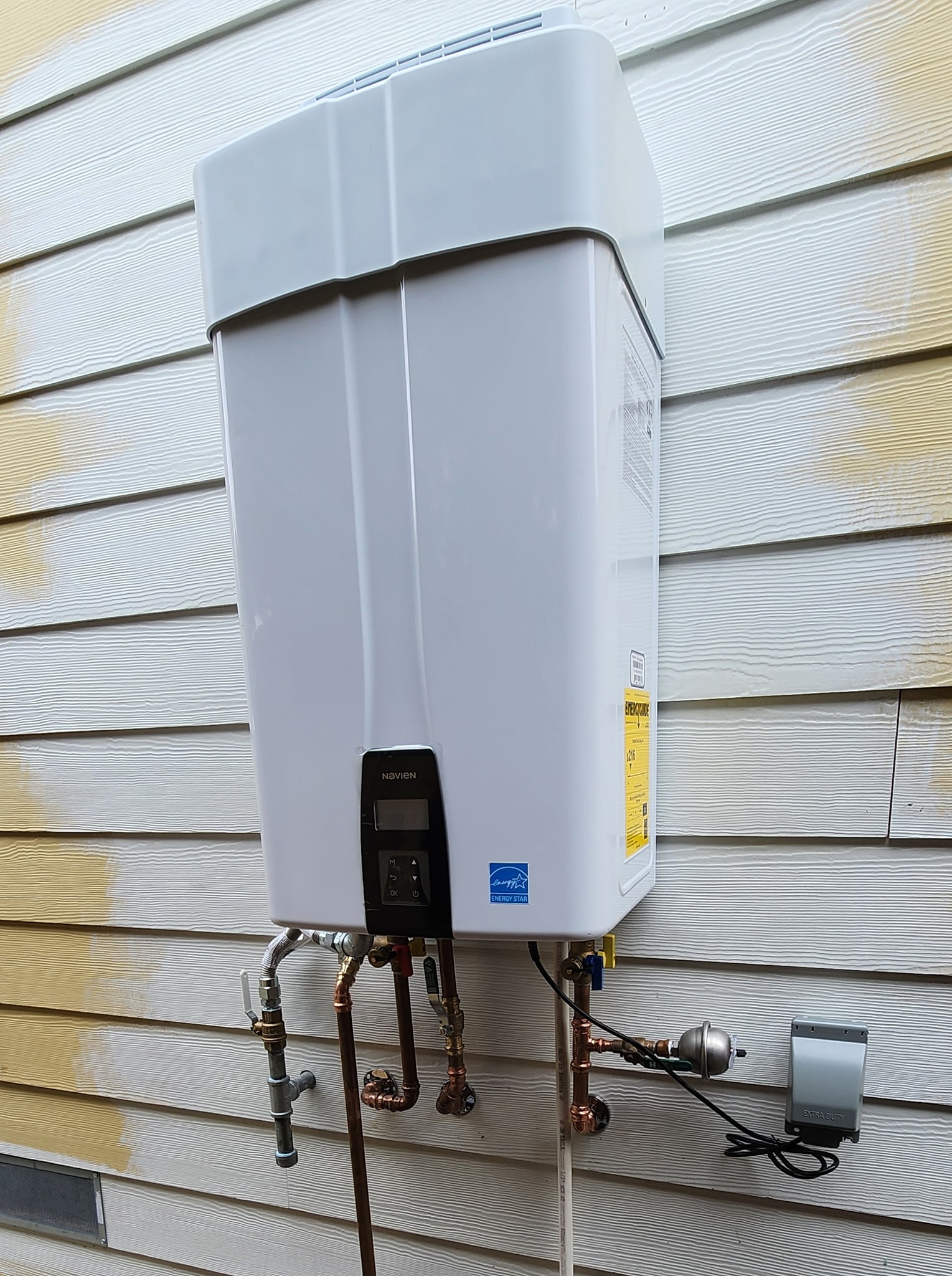 Vallejo plumber installing a tankless water heater